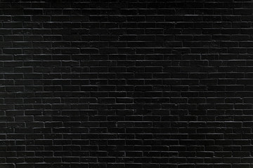 Fototapeta na wymiar black brick wall may used as background