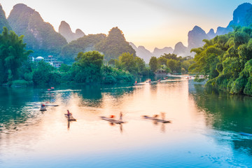 Landscape of Guilin. Tourists are visiting by Bamboo raft. Located in Yangshuo, Guilin, Guangxi,...