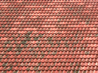 Roofing texture. Red corrugated tile element of roof. Seamless pattern. close up of red roof texture tile.
