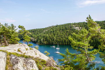 Fototapeta premium boats at anchor in Covered Portage, Killarney, Ontario, Canada