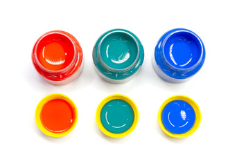 Pots of paint, red, green and blue