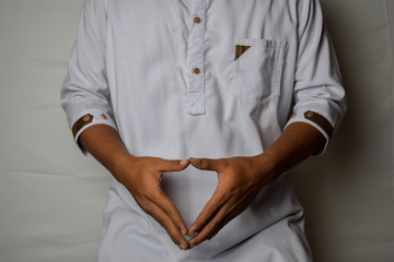 Close up Asian man shows hand gestures it means human emotion and expression isolated on white background
