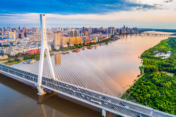 Harbin skyline. Songpu Bridge and Songhua River. Located in Harbin, Heilongjiang, China.