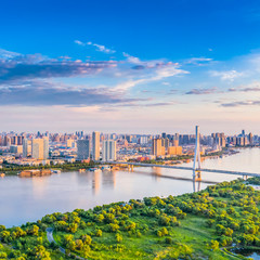 Obraz premium Harbin skyline. Songpu Bridge and Songhua River. Located in Harbin, Heilongjiang, China.