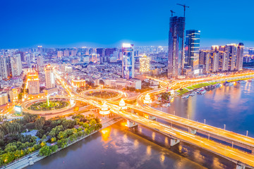 Fototapeta premium Cityscape of Harbin. Songhuajiang Gonglu Bridge. Located in Harbin, Heilongjiang, China.
