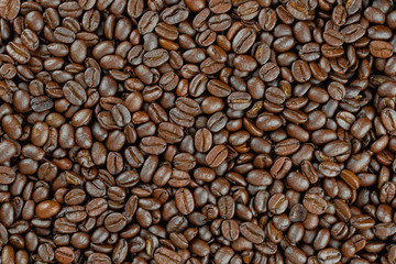 Roasted coffee beans texture background.