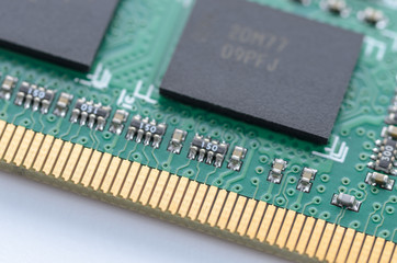 close up of computer RAM memory microchip module, printed circuit board or PCB