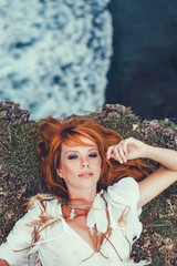 Pretty woman posing in the sea, blue sky, hair wild, victory, boho, outdoor portrait hipster, fashion model, pretty female, denim shorts, hippie, tattoo, hipster girl, Bali, white dress,cute. make 