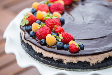 Cheese cake with chocolate and organic berries