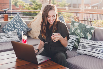 Pretty Young Beauty Woman Using Laptop in cafe, outdoor portrait business woman, hipster style,...