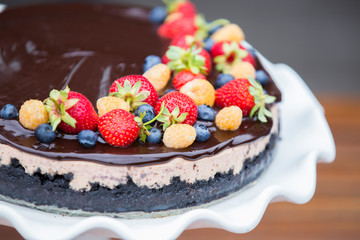 Cheese cake with chocolate and organic berries