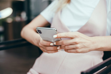Young beauty girl purple hair make selfie on smartphone, happy face, outdoor hipster portrait on the street, smile happy face, listen music on headphones, Amsterdam street, dance, player,photo concept