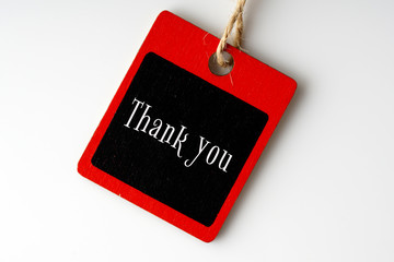 Thank you wording wrote on chalkboard over white background
