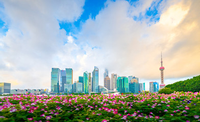 The morning of Lujiazui in Shanghai, China, with the prospect of flower beds