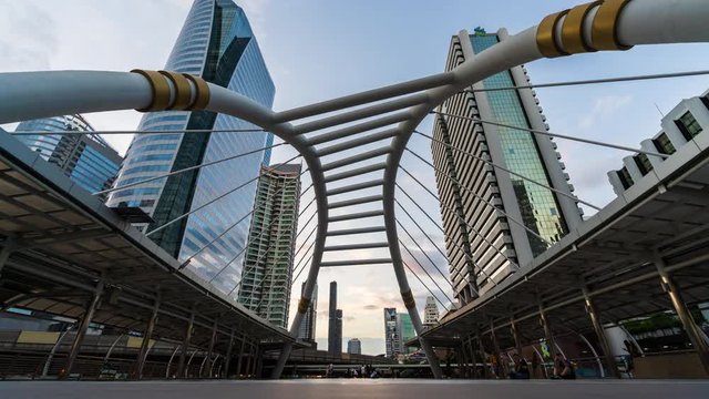 day to night time lapse of Chong Nonsi skytrain station in Bangkok,  Thailand