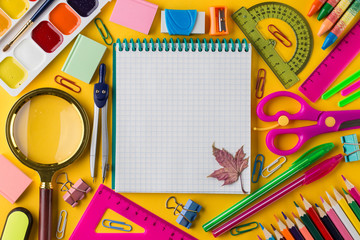 School notebook and various stationery. Education concept.