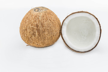 Cut half of the coconut on the white background.