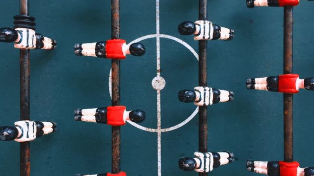 Top view live table soccer football game match day leisure time competition sports battle overview goal win ball vintage retro games blue field no offside