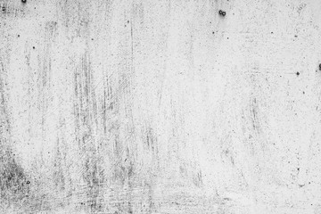 Texture of a concrete wall with cracks and scratches which can be used as a background