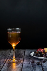 Amber wine. Wine in a glass. Traditional Georgian wine according to ancient technology. Close up