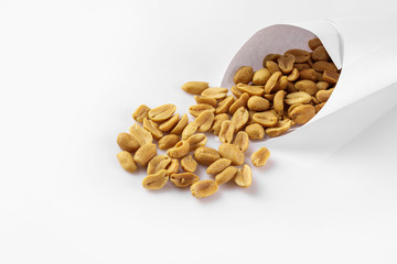 salted peanuts isolated on the white background.