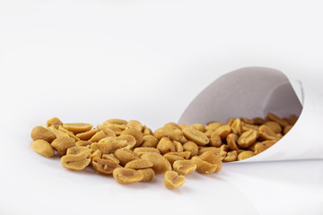 salted peanuts isolated on the white background.