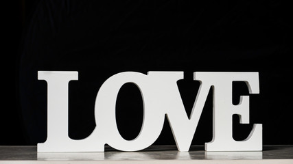 love word in black background