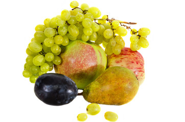 fruits isolated on a white background. Close-up. Grapes, apple, pear, plum. Close-up.