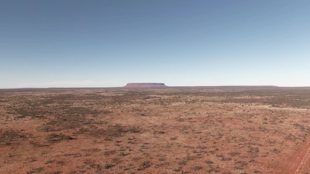 Aerial footage of Mount Conner, AKA F-uluru out in the Australian Northern Territory deserts
