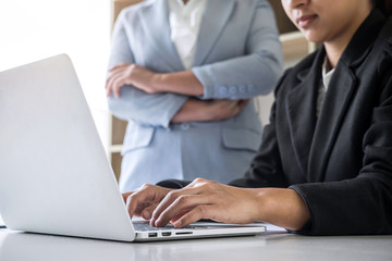 Businesswoman leader team conference on meeting presentation to planning investment project working and strategy of business making conversation with partner, financial and accounting concept