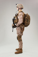 Rear view of military soldier US army marines operator studio shot portrait