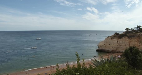 Seascape timelapse view on Praia da Cova Redonda on the south coast of Algarve tourist destination region, Portugal.