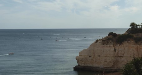 Seascape timelapse view on Praia da Cova Redonda on the south coast of Algarve tourist destination region, Portugal.