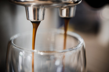 close up cup of coffee espresso with coffee machine 