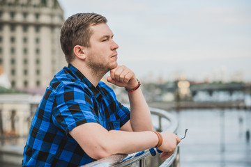 Fototapeta premium Problems and experience young people in big city life. Philosophy of men