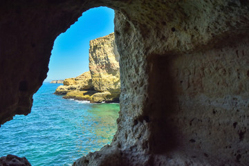 View from a stone grotto on the sea coast