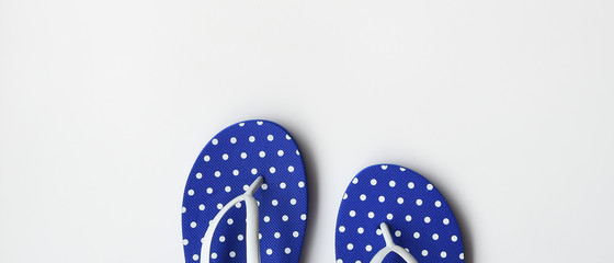 Blue flip flops isolated on white background