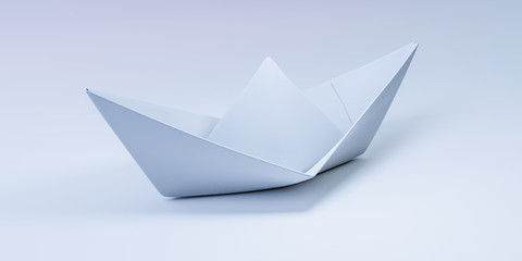 Papierboot vor weißem Hintergrund