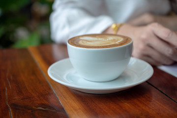 Women sitting in coffee shop for drink in coffee time