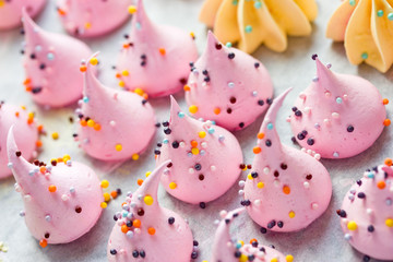 Pink meringues, sweet meringue kiss cookies - obrazy, fototapety, plakaty