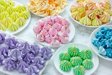 Obraz na płótnie Canvas Set of colorful homemade meringue cookies different shapes and colors