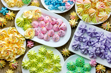 Set of colorful homemade meringue cookies different shapes and colors