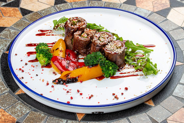 Veal rolls with foie gras and grilled vegetables