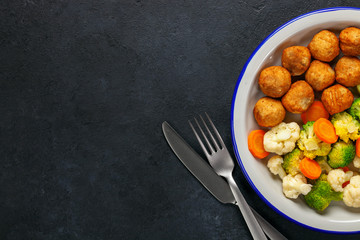 Meatballs with broccoli and a cauliflower