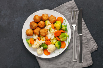 Meatballs with broccoli and a cauliflower