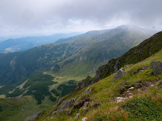 Mountain valley during sunrise / sunset. Natural summer landscape. Colorful summer landscape in the Carpathian mountains.