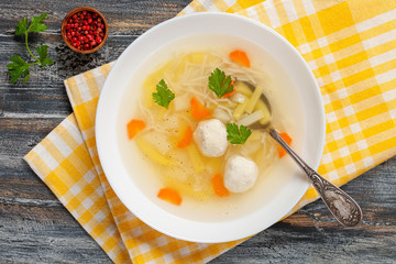 Soup with chicken meatballs, potato and pasta