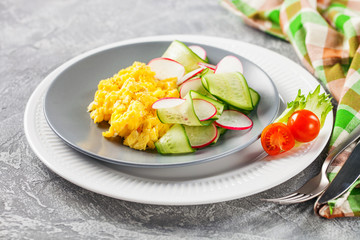 Scrambled  eggs with cucumber and radish