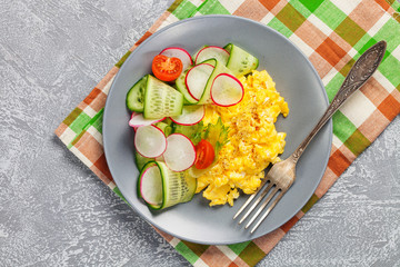 Scrambled  eggs with cucumber and radish