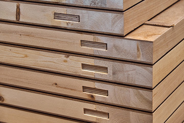 Joinery. Wood door manufacturing process. Stacked door leafs. Furniture manufacture.
